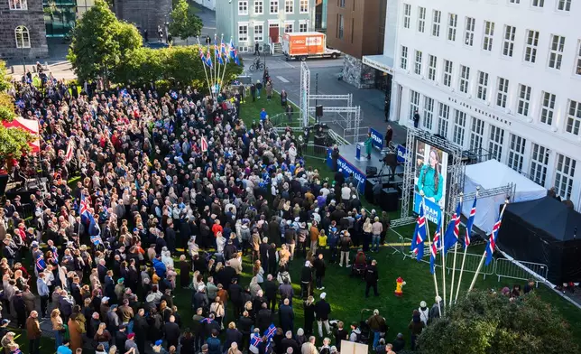 People gather for an "Afram Island," "Forward, Iceland," rally opposing the resumption of European Union accession talks at Austurvollur in Reykjavik, Iceland, Thursday, Aug. 27, 2026. (AP Photo/Marco Di Marco)