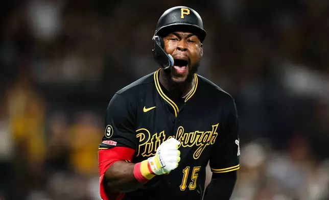 Pittsburgh Pirates' Oneil Cruz reacts after hitting a solo home run against the San Diego Padres in the ninth inning of a baseball game Tuesday, Aug. 25, 2026, in San Diego. (AP Photo/Derrick Tuskan)
