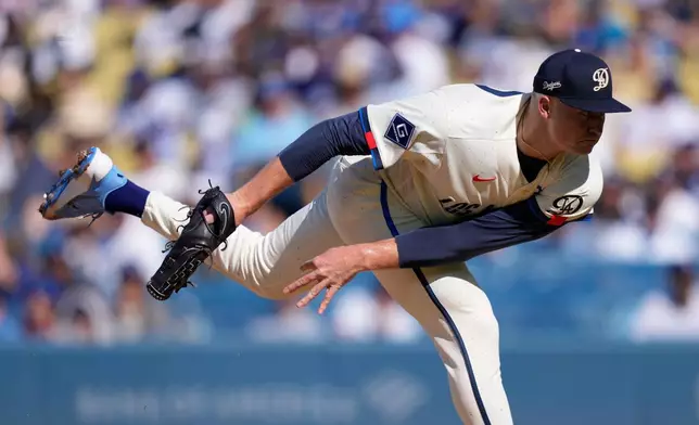 Los Angeles Dodgers starting pitcher Tarik Skubal throws to the plate during the first inning of a baseball game against the Pittsburgh Pirates, Saturday, Aug. 22, 2026, in Los Angeles. (AP Photo/Mark J. Terrill)