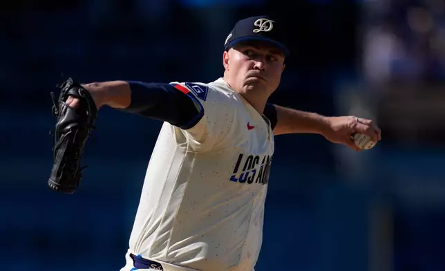 Los Angeles Dodgers starting pitcher Tarik Skubal throws to the plate during the sexond inning of a baseball game against the Pittsburgh Pirates, Saturday, Aug. 22, 2026, in Los Angeles. (AP Photo/Mark J. Terrill)
