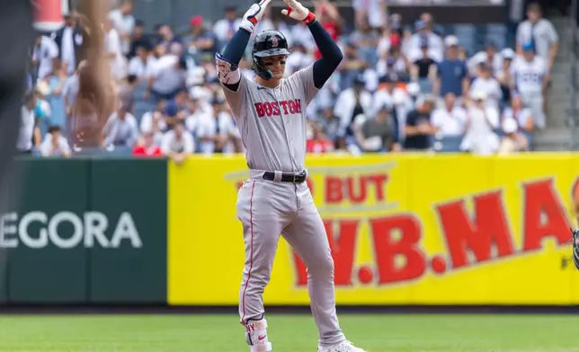 Boston Red Sox's Roman Anthony celebrates after his ground rule double in the first inning during a baseball game against the New York Yankees, Sunday, Aug. 30, 2026, in New York. (AP Photo/Corey Sipkin)