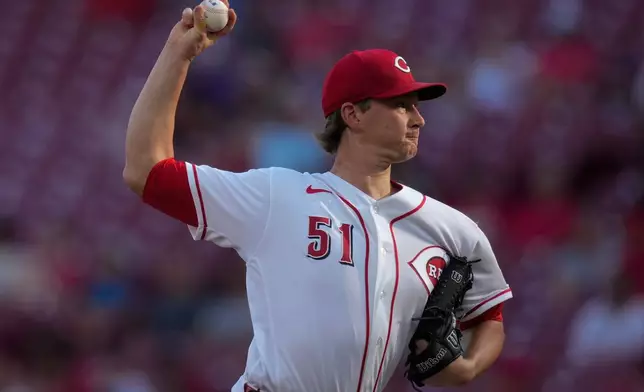 Cincinnati Reds pitcher Brady Singer throws during the first inning of a baseball game against the Athletics in Cincinnati, Tuesday, Aug. 4, 2026. (AP Photo/Carolyn Kaster)