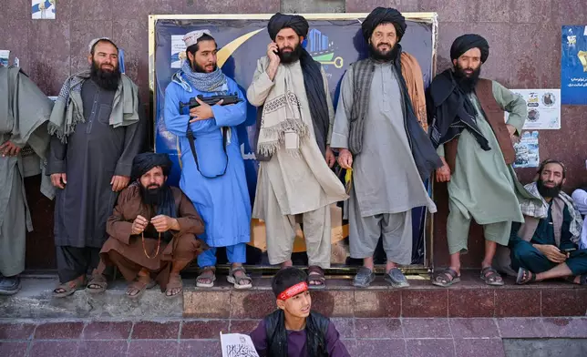 Taliban government supporters attend celebrations marking the fifth anniversary of the U.S. withdrawal from Afghanistan and the Taliban's return to power, in Kabul, Afghanistan, Saturday, Aug. 15, 2026. (AP Photo/Nava Jamshidi)