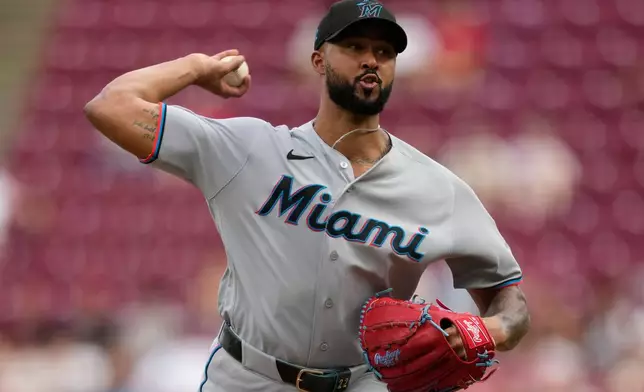 Miami Marlins pitcher Sandy Alcantara throws during the first inning of a baseball game against the Cincinnati Reds in Cincinnati, Friday, Aug. 14, 2026. (AP Photo/Carolyn Kaster)