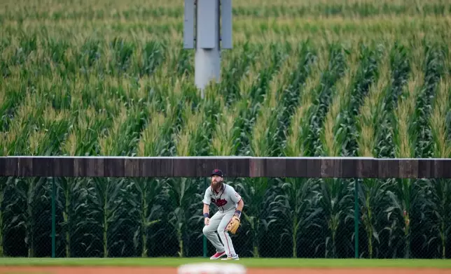 Philadelphia Phillies left fielder Brandon Marsh gets set for a play during the second inning of a baseball game against the Minnesota Twins at the Field of Dreams movie site, Thursday, Aug. 13, 2026, in Dyersville, Iowa. (AP Photo/Charlie Neibergall)