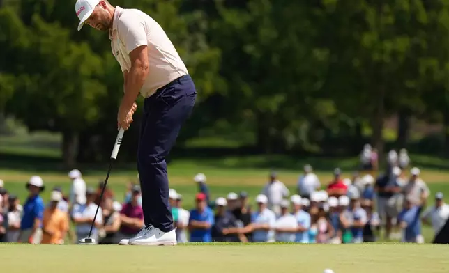 Wyndham Clark putts on the second green in the final round of the BMW Championship golf tournament, Sunday, Aug. 23, 2026, in St. Louis. (AP Photo/Jeff Roberson)