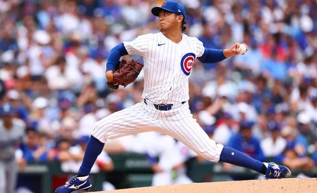 Chicago Cubs pitcher Shota Imanaga throws to a Los Angeles Dodgers batter during the first inning of a baseball game in Chicago, Wednesday, Aug. 5, 2026. (AP Photo/Jessie Alcheh)