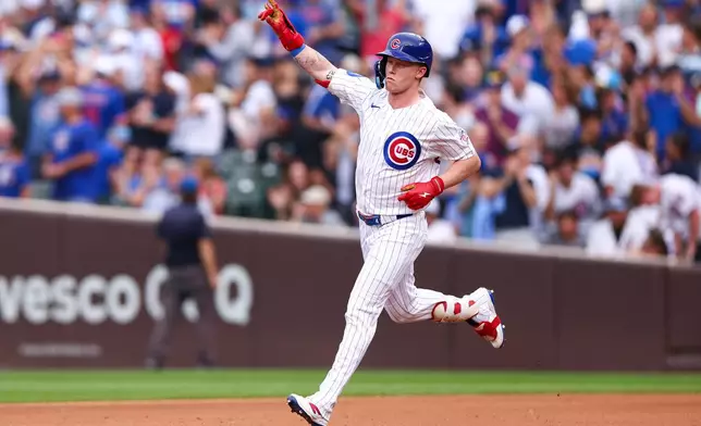 Chicago Cubs designated hitter Pete Crow-Armstrong gestures while running the bases after hitting a home run during the fourth inning of a baseball game against the Los Angeles Dodgers in Chicago, Wednesday, Aug. 5, 2026. (AP Photo/Jessie Alcheh)