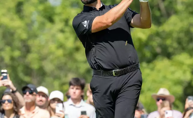 Captain Jon Rahm, of Legion XIII, hits from the ninth tee during the final round of LIV Golf Indianapolis, Sunday, Aug. 23, 2026, in Westfield, Ind. (Montana Pritchard/LIV Golf via AP)
