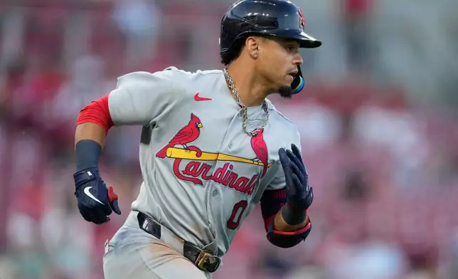 St. Louis Cardinals' Masyn Winn rounds the bases after hitting a solo home run in the fifth inning of a baseball game against the Cincinnati Reds, Tuesday, Aug. 18, 2026, in Cincinnati. (AP Photo/Carolyn Kaster)