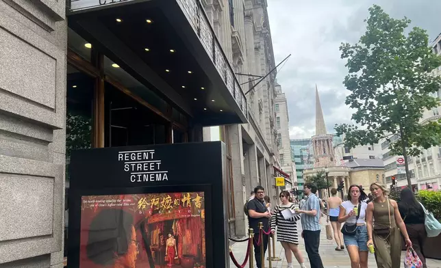In this photo released by Xinhua News Agency, a poster is displayed outside a cinema before the premiere of Chinese film "Dear You" in London, on June 20, 2026. (Zhao Jiasong/Xinhua via AP)