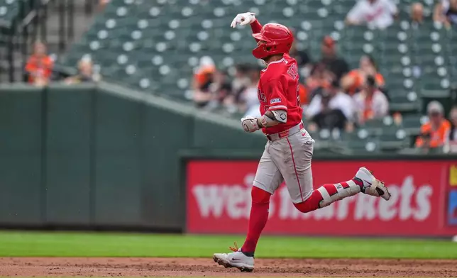 Los Angeles Angels' Zach Neto rounds the bases after hitting a three-run home run during the third inning of a baseball game against the Baltimore Orioles, Thursday, Aug. 6, 2026, in Baltimore. (AP Photo/Stephanie Scarbrough)