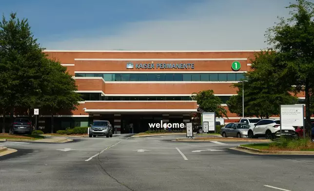 Signs mark the exterior of Kaiser Permanente medical center in Jonesboro, Ga., Thursday, Aug. 6, 2026. (AP Photo/Emilie Megnien)
