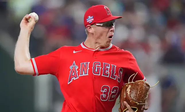 Los Angeles Angels starting pitcher Ryan Johnson throws during the first inning of a baseball game against the Texas Rangers, Saturday, Aug. 22, 2026, in Arlington, Texas. (AP Photo/LM Otero)