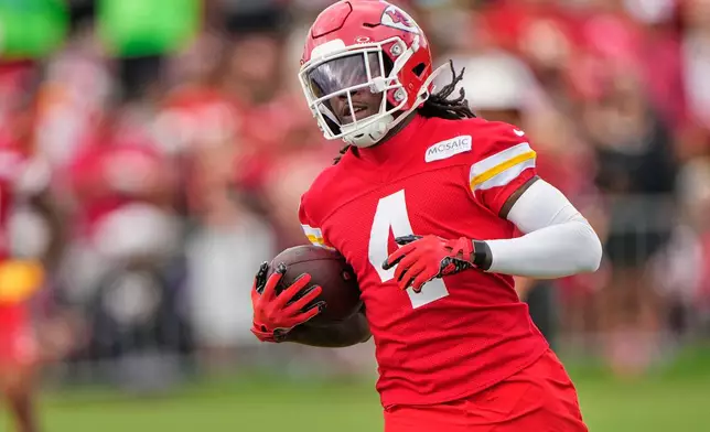 Kansas City Chiefs wide receiver Rashee Rice runs during NFL football training camp Saturday, Aug. 1, 2026, in St. Joseph, Mo. (AP Photo/Charlie Riedel)
