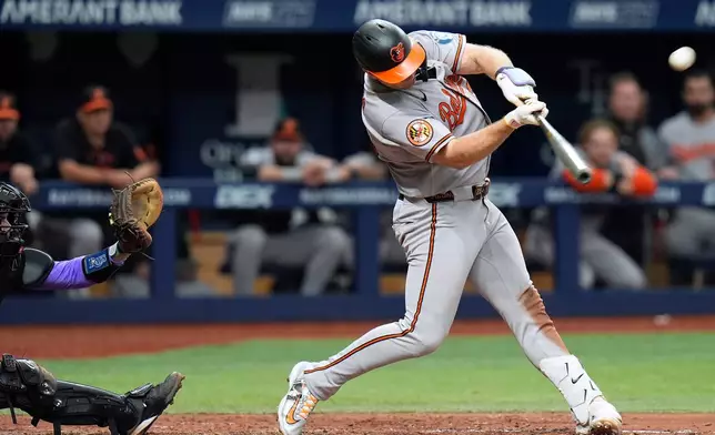 Baltimore Orioles' Pete Alonso connects for a home run off Tampa Bay Rays pitcher Ian Seymour during the fifth inning of a baseball game Saturday, Aug. 15, 2026, in St. Petersburg, Fla. (AP Photo/Chris O'Meara)