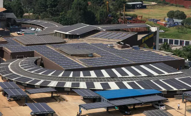 FILE - A solar power plant is seen at the car park of Two Rivers Complex in Nairobi, Kenya, July 16, 2026. (AP Photo/Andrew Kasuku, File)