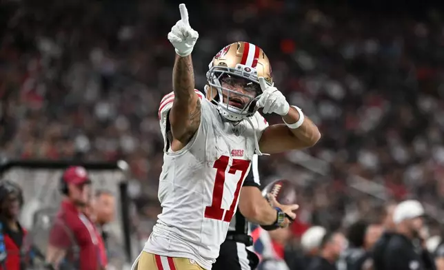 San Francisco 49ers wide receiver Jordan Watkins celebrates after a first down during the second half of an NFL preseason football game against the Las Vegas Raiders, Thursday, Aug. 27, 2026, in Las Vegas. (AP Photo/David Becker)