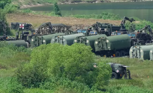 The U.S. Army's armored vehicles gather to cross a river at a training field in Yeoncheon, South Korea, near the border with North Korea, Tuesday, Aug. 18, 2026. (AP Photo/Ahn Young-joon)