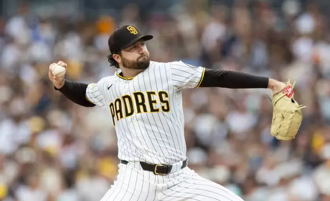 San Diego Padres starting pitcher Casey Mize works against a Milwaukee Brewers batter in the first inning of a baseball Monday, Aug. 10, 2026, in San Diego. (AP Photo/Karl Anderson)