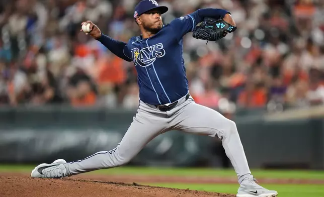Tampa Bay Rays starting pitcher Freddy Peralta delivers during the third inning of a baseball game against the Baltimore Orioles, Friday, Aug. 21, 2026, in Baltimore. (AP Photo/Stephanie Scarbrough)