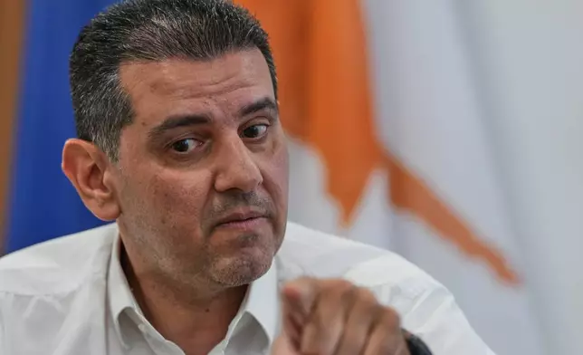 Cyprus' Energy Minister Michael Damianos talks during an interview with The Associated Press in Nicosia, Cyprus, on Aug. 7, 2026. (AP Photo/Petros Karadjias)