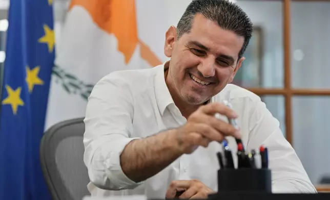 Cyprus' Energy Minister Michael Damianos is interviewed by The Associated Press in Nicosia, Cyprus, on Aug. 7, 2026. (AP Photo/Petros Karadjias)