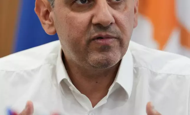 Cyprus' Energy Minister Michael Damianos talks during an interview with The Associated Press in Nicosia, Cyprus, on Aug. 7, 2026. (AP Photo/Petros Karadjias)