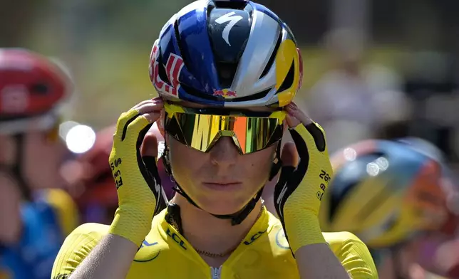 Netherlands' Demi Vollering prepares for the start of the ninth stage of the Women's Tour de France cycling race (Tour de France Femmes) in Nice, France, Sunday, Aug. 9, 2026. (AP Photo/Philippe Magoni)