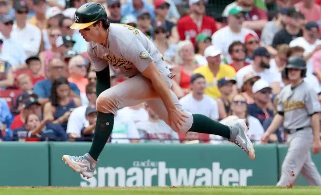 Athletics designated hitter Tyler Soderstrom runs to home plate to score during the fourth inning of a baseball game against the Boston Red Sox, Sunday, Aug. 9, 2026, in Boston. (AP Photo/Mark Stockwell)