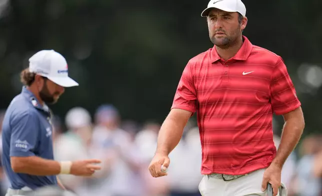Scottie Scheffler walks on the first green during the third round of the PGA Tour Championship golf tournament, Saturday, Aug 29, 2026, in Atlanta.(AP Photo/Mike Stewart)