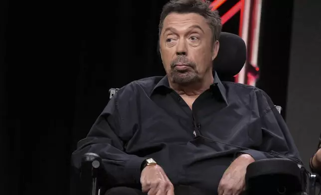 FILE - Tim Curry participates in the panel for "The Rocky Horror Picture Show" during the Fox Television Critics Association summer press tour in Beverly Hills, Calif., on Aug. 8, 2016, (Photo by Richard Shotwell/Invision/AP, File)