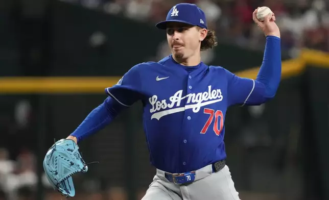 Los Angeles Dodgers pitcher Justin Wrobleski throws against the Arizona Diamondbacks in the first inning of a baseball game, Sunday, Aug 9, 2026, in Phoenix. (AP Photo/Rick Scuteri)
