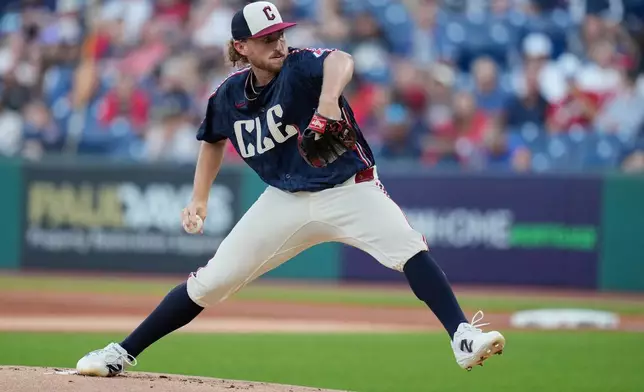 Cleveland Guardians' Tanner Bibee pitches in the first inning of a baseball game against the Kansas City Royals in Cleveland, Friday, Aug. 28, 2026. (AP Photo/Sue Ogrocki)