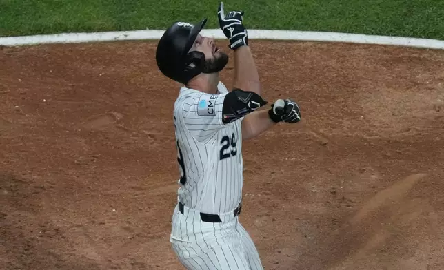 Chicago White Sox's Tristan Peters gestures after hitting a home run against the Texas Rangers during the sixth inning of a baseball game Tuesday, Aug. 25, 2026, in Chicago. (AP Photo/David Banks)