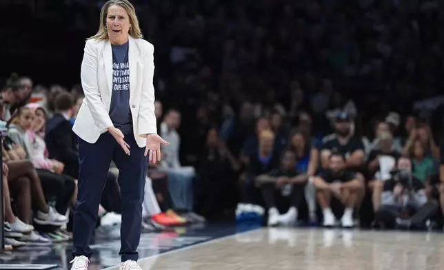 Minnesota Lynx head coach Cheryl Reeve reacts during the first half of a WNBA basketball game against the Las Vegas Aces in Minneapolis, Saturday, Aug. 8, 2026. (AP Photo/Abbie Parr)