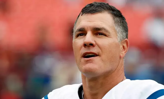 FILE - Indianapolis Colts kicker Adam Vinatieri warms up before an NFL football game against the Washington Redskins in Landover, Md., Sept. 16, 2018. (AP Photo/Alex Brandon, File)
