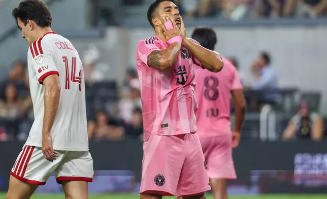 Inter Miami forward Luis Suárez (9) reacts after missing a shot during the first half of an MLS soccer game against Toronto FC on Saturday, Aug. 22, 2026, in Miami. (AP Photo/David Santiago)