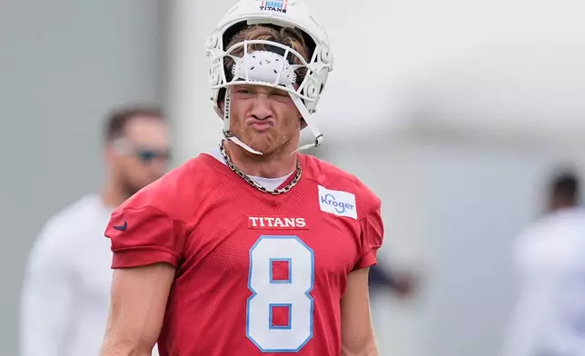 Tennessee Titans quarterback Will Levis (8) walks across the field during the NFL football team's training camp Saturday, Aug. 1, 2026, in Nashville, Tenn. (AP Photo/George Walker IV)