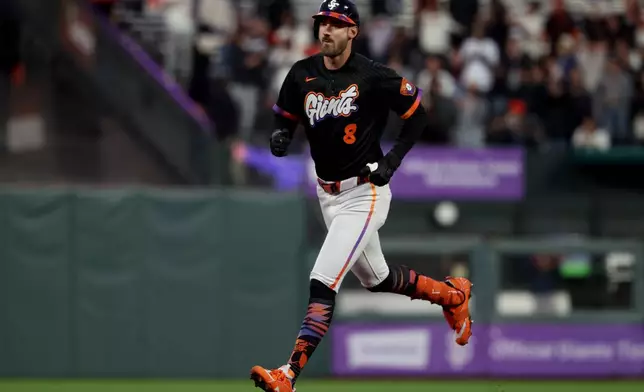 San Francisco Giants' Bryce Eldridge (8) rounds the bases after hitting a home run during the fifth inning of a baseball game against the Houston Astros in San Francisco, Tuesday, Aug. 11, 2026. (AP Photo/Jed Jacobsohn)