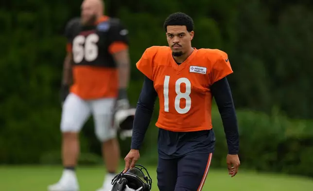 Chicago Bears quarterback Caleb Williams (18) arrives for a joint NFL football practice with the Cincinnati Bengals, Thursday, Aug. 20, 2026, in Cincinnati. (AP Photo/Carolyn Kaster)