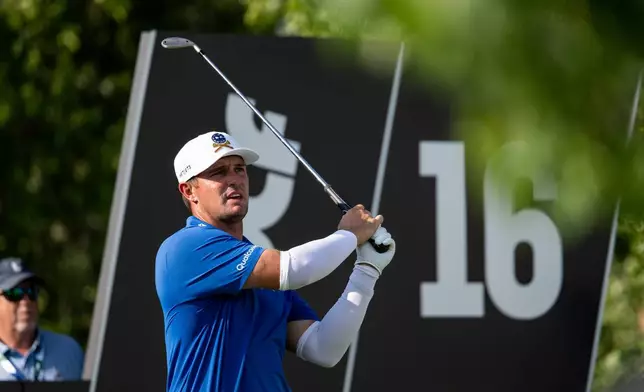 Captain Bryson DeChambeau, of Crushers GC, hits from the 16th tee during the first round of LIV Golf Bedminster at Trump National Golf Club, Thursday, Aug. 6, 2026, in Bedminster, N.J. (Montana Pritchard/LIV Golf via AP)