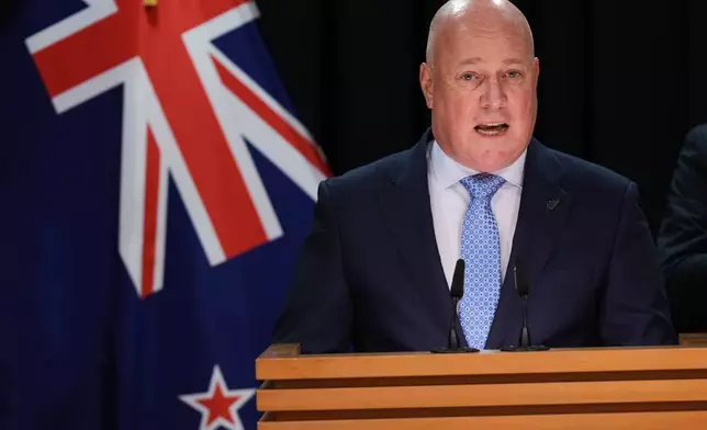 FILE - New Zealand Prime Minister Christopher Luxon speaks at a news conference at Parliament in Wellington, New Zealand, on July 20, 2026. (AP Photo/Charlotte Graham-McLay, File)
