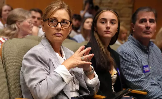 Sen. Darline Graham, R-S.C., from left, seated alongside daughter Nicole Nordone and husband Larry Nordone, looks on as a South Carolina Republican Senate candidate stump event gets underway ahead of the special GOP primary to replace her late brother, Sen. Lindsey Graham, R-S.C., Saturday, Aug. 1, 2026, in Lexington, S.C. (AP Photo/Meg Kinnard)