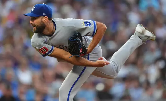 Kansas City Royals starting pitcher Michael Wacha works against the Colorado Rockies in the first inning of a baseball game Friday, July 31, 2026, in Denver. (AP Photo/David Zalubowski)