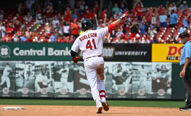 St. Louis Cardinals' Alec Burleson (41) rounds the bases after hitting a solo home run in the fifth inning of a baseball game against the Colorado Rockies, Sunday, Aug. 9, 2026, in St. Louis. (AP Photo/Joe Puetz)