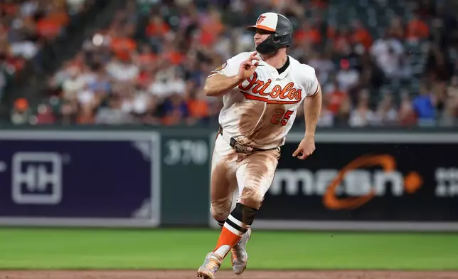Baltimore Orioles' Pete Alonso advances to third base on double hit by Coby Mayo off of Tampa Bay Rays pitcher Shane McClanahan during the third inning of baseball game in Baltimore, Saturday, Aug. 22, 2026. (AP Photo/Terrance Williams)