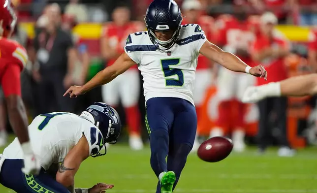 Seattle Seahawks kicker Jason Myers (5) misses a field goal attempt as Seahawks holder Michael Dickson (4) holds his position during the second half of a preseason NFL football game against the Kansas City Chiefs, Friday, Aug. 28, 2026, in Kansas City, Mo. (AP Photo/Charlie Riedel)