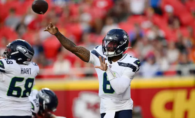 Seattle Seahawks quarterback Jalen Milroe throws against the Kansas City Chiefs during the first half of a preseason NFL football game, Friday, Aug. 28, 2026, in Kansas City, Mo. (AP Photo/Reed Hoffmann)