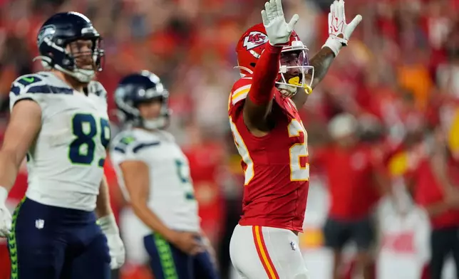 Kansas City Chiefs safety Xavier Nwankpa, right, celebrates a missed field goal by Seattle Seahawks place kicker Jason Myers (5) as Seahawks tight end Nick Kallerup (89) looks on during the second half of a preseason NFL football game, Friday, Aug. 28, 2026, in Kansas City, Mo. (AP Photo/Charlie Riedel)